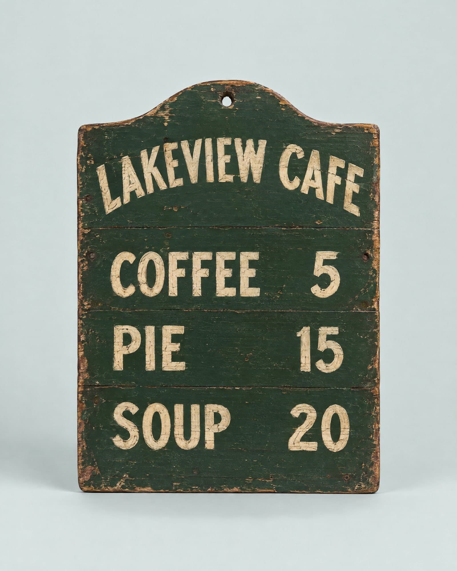 A green painted menu board reading Lakeview Cafe: coffee 5, pie 15, soup 20.